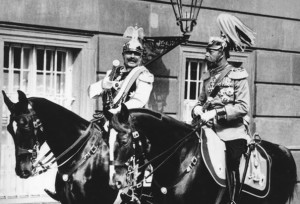 German Kaiser Wilhelm II, left, and British King George V were first cousins and grandsons of the late Queen Victoria as was Czar Nicolas II of Russia.  None of the trio escaped unscathed from the war.  Bolshevists killed Nicolas and his family in 1918, Wilhelm fled to Holland where his health deteriorated.  King George V survived but aged under the weight of responsibility during the war.  His dark beard and hair turned white almost over night after a visit to the Western Front.
