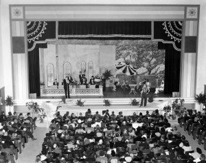 A photo of the stage at Greenville Municipal Auditorium during a Women's Club event in the 1940's.