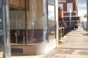 The distinctive curved glass at the entrance to the old Kress store, now Landon Winery & Bistro.