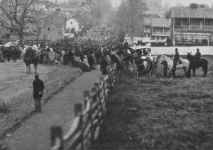 This photograph was taken by famed Civil War photographer Matthew Brady on November 19, 1863 on the occasion of the dedication of the Gettysburg military cemetery. It shows a Regiment marching down a village street in Gettyburg.