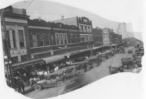 Lee Street on a Saturday afternoon in the summer of 1925.  Everyone came to town to visit, to shop, and make a few trades.  Notice the IOOF Building at the far right.   The Greenville National Exchange Bank would soon move to the opposite corner. (Photo courtesy of author.)